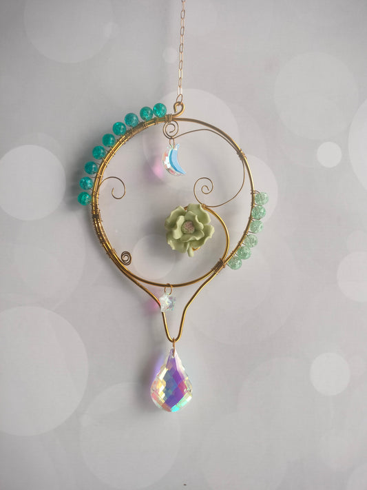 Teal and sea green suncatcher